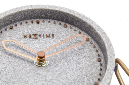 NeXtime Clocks table clock made of polyresin, measuring 17.5 x 15.5 x 5 cm, with a detailed cross design.