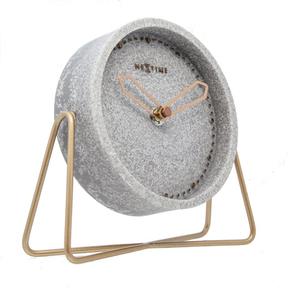 NeXtime Clocks table clock with a polyresin design, measuring 17.5 x 15.5 x 5 cm, shown from the left side.