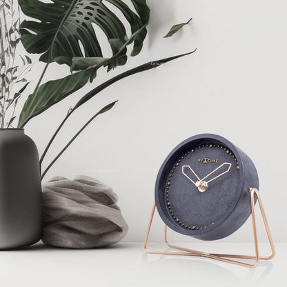 NeXtime Clocks table clock in polyresin, 17.5 x 15.5 x 5 cm, featuring a stylish, modern design suitable for tabletop display.
