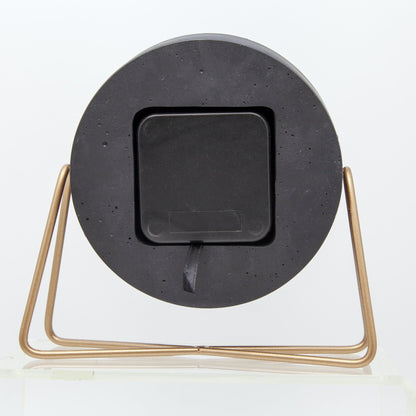 NeXtime Clocks polyresin table clock with a cross design, measuring 17.5 x 15.5 x 5 cm, shown from the back.