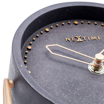 NeXtime Clocks table clock made of polyresin, measuring 17.5 x 15.5 x 5 cm, with a detailed decorative design.