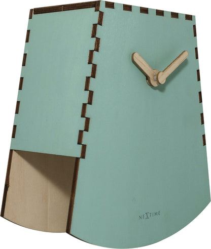 NeXtime Rocky wooden table clock, 20cm motion clock with a natural wood finish, shown from the left side.
