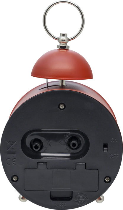 NeXtime Clocks metal alarm clock with 16 cm diameter and loud single bell sound, detailed view of the clock's face and bell.