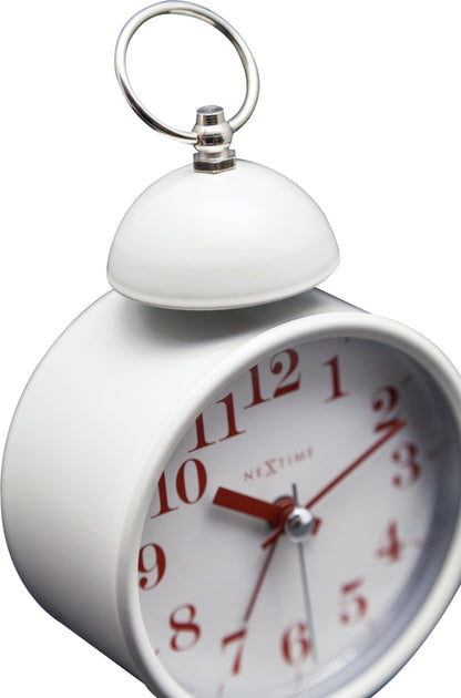 NeXtime Clocks metal alarm clock with a 16cm single bell design and loud alarm feature, detailed view of the clock face.