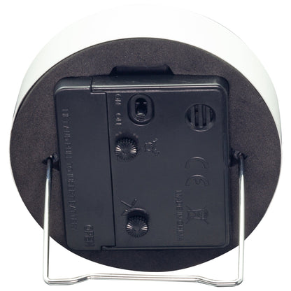 NeXtime Clocks small metal table alarm clock with light function, silent operation, 9x9x7.5cm, shown from the back view.