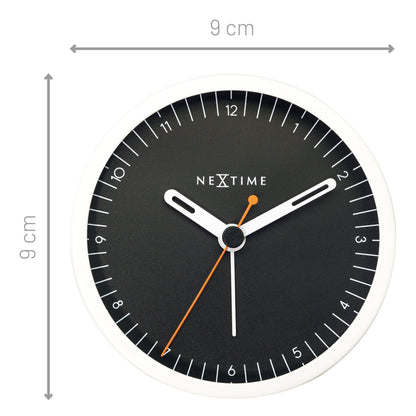 Small NeXtime Clocks metal table alarm clock with silent mechanism and light function, measuring 9x9x7.5cm.