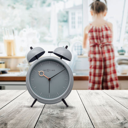NeXtime Clocks golden hour metal alarm clock with light function, silent operation, measuring 15x18x7cm.
