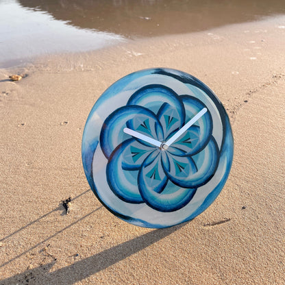 NeXtime Clocks blue 20cm silent table wall clock with tempered glass, modern design, labeled "Cosmo Table."