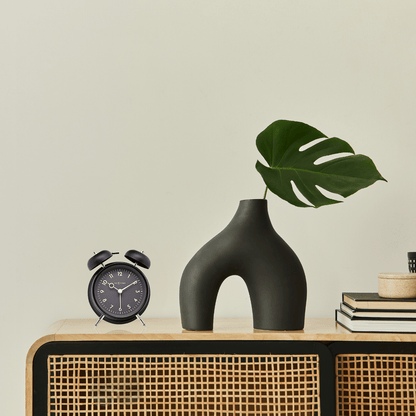 NeXtime Golden Hour metal alarm clock with a 12x14x6cm design, featuring a sleek, modern look and clear time display.