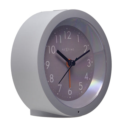 NeXtime Circle alarm clock with silent light dial, 10.5cm x 3.6cm, shown from the left side.