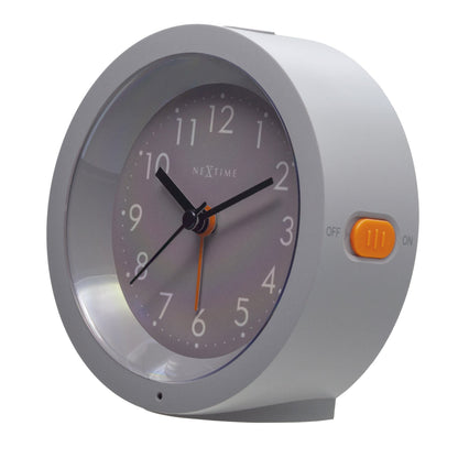 NeXtime Circle alarm clock with silent light dial, measuring 10.5cm x 3.6cm, shown from the right side view.