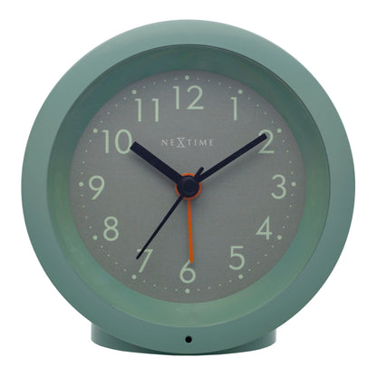 NeXtime Circle alarm clock with silent light dial, 10.5cm x 3.6cm, featuring a modern round design and clear display.