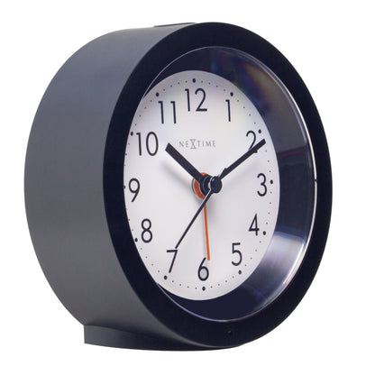 NeXtime Circle alarm clock with silent light dial, measuring 10.5cm by 3.6cm, showcasing a modern design and left side view.