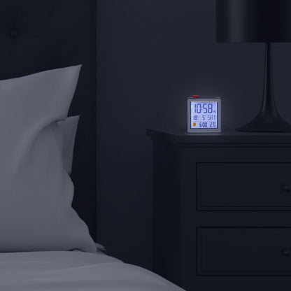 Mini digital alarm clock by NeXtime Clocks with metal and ABS construction, featuring a compact 6x6.4x2.1cm design.