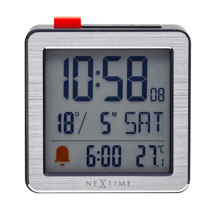 Mini digital alarm clock by NeXtime with metal and ABS casing, clear LED display, compact 6x6.4x2.1cm design.