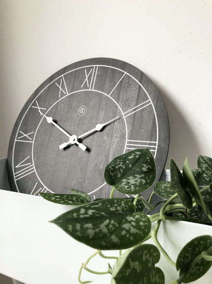 NeXtime Clocks wooden wall clock, 40 cm diameter, 'Paul' design with a natural wood finish and minimalist style.