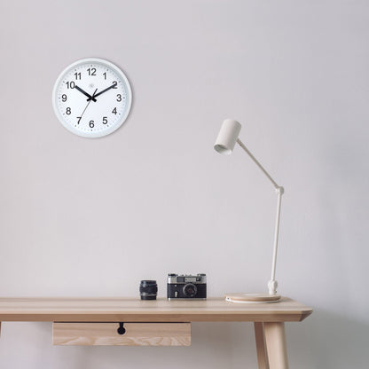 NeXtime Clocks silent wall clock, 25.5cm plastic design with a modern "Robust" style, shown hanging on a wall.