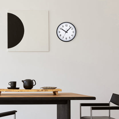 NeXtime Clocks silent wall clock, 25.5cm diameter, plastic construction, labeled "Robust" with a modern design.