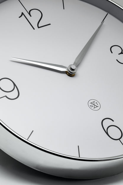 NeXtime Finesse wall clock with 30.5cm diameter, gold, chrome, and grey plastic finish, silent operation, detailed close-up image