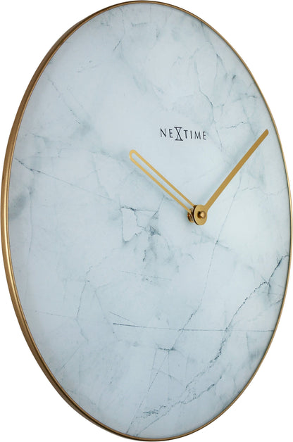NeXtime Clocks wall clock with 40 cm marble glass and metal design, showing a close-up of the left side.