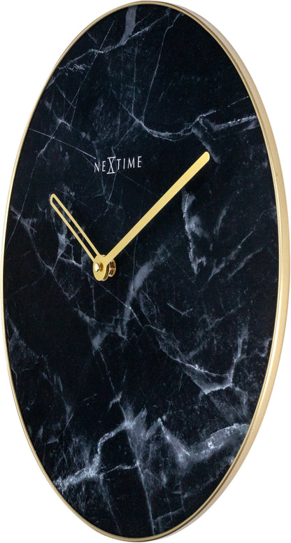 NeXtime Clocks marble wall clock with a 40 cm glass and metal design, showing the right side of the clock.