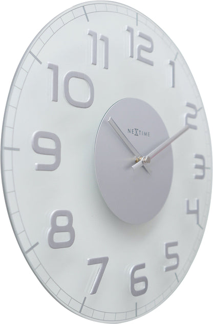NeXtime Clocks glass wall clock, 30x3.5 cm, round design with a sleek, modern appearance, shown from the right side.
