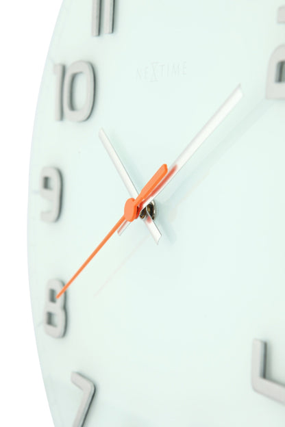 NeXtime Clocks glass wall clock, 30x3.5 cm, round design with a clear, elegant face and minimalist style.
