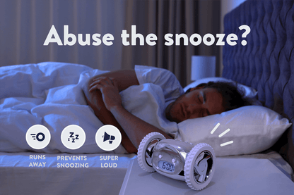 NeXtime Clocks Clocky Chrome alarm clock on wheels with sleek chrome finish on a modern lifestyle background