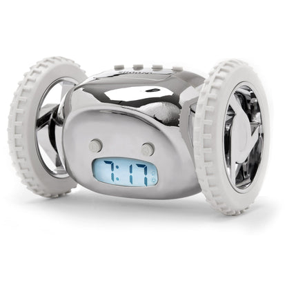 NeXtime Clocks Clocky Chrome alarm clock on wheels with a sleek chrome finish and digital display.