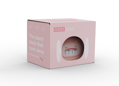 Pink NeXtime Clocks Clocky alarm clock on wheels with digital display and colorful design, shown from an angled view.