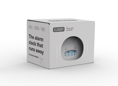 White NeXtime Clocky alarm clock with wheels, shown from an angled side view.
