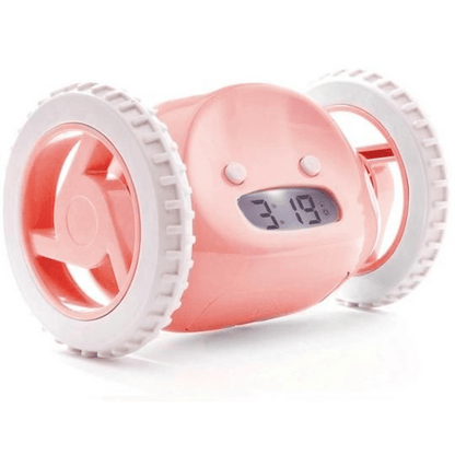 NeXtime Clocks Clocky Pink alarm clock on wheels with digital display and playful design, perfect for waking up mornings.