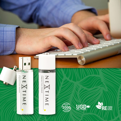 Two NeXtime Clocks AA USB batteries, empty content with USB connector visible, used for powering clocks or electronic devices.